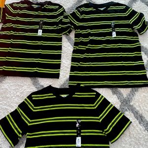 Black and Green shirts. New never used. Can be worn for Small to medium men also